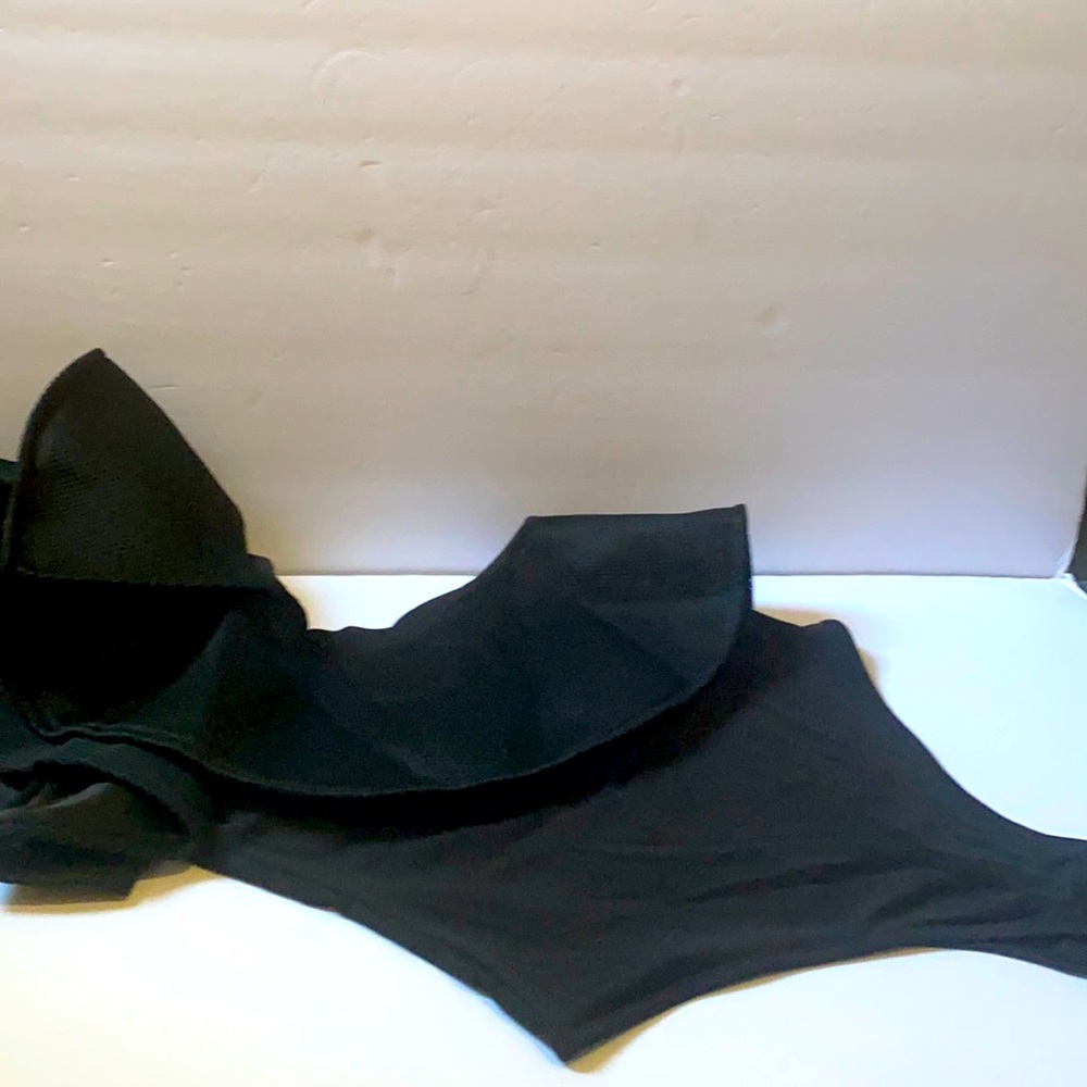 Black off the shoulder bodysuit from a boutique